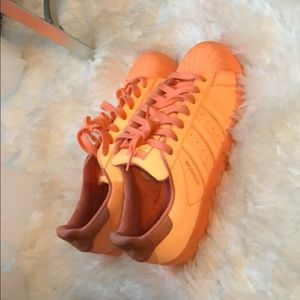Orange adidas shoes ,